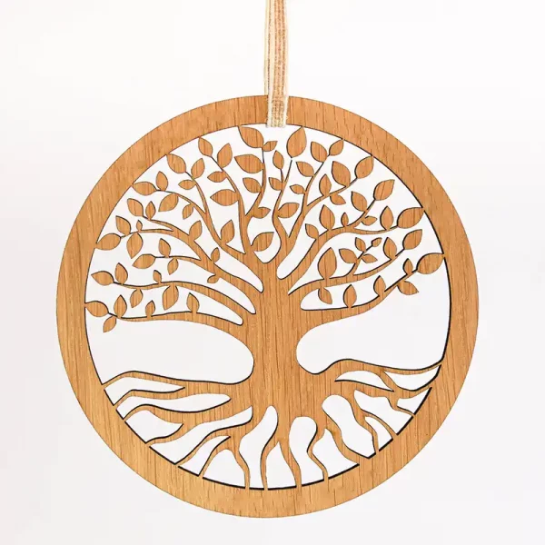 Image showing a circular laser cut decoration featuring a tree of life. Designed and handcrafted in Scotland by Kyloe Creations.